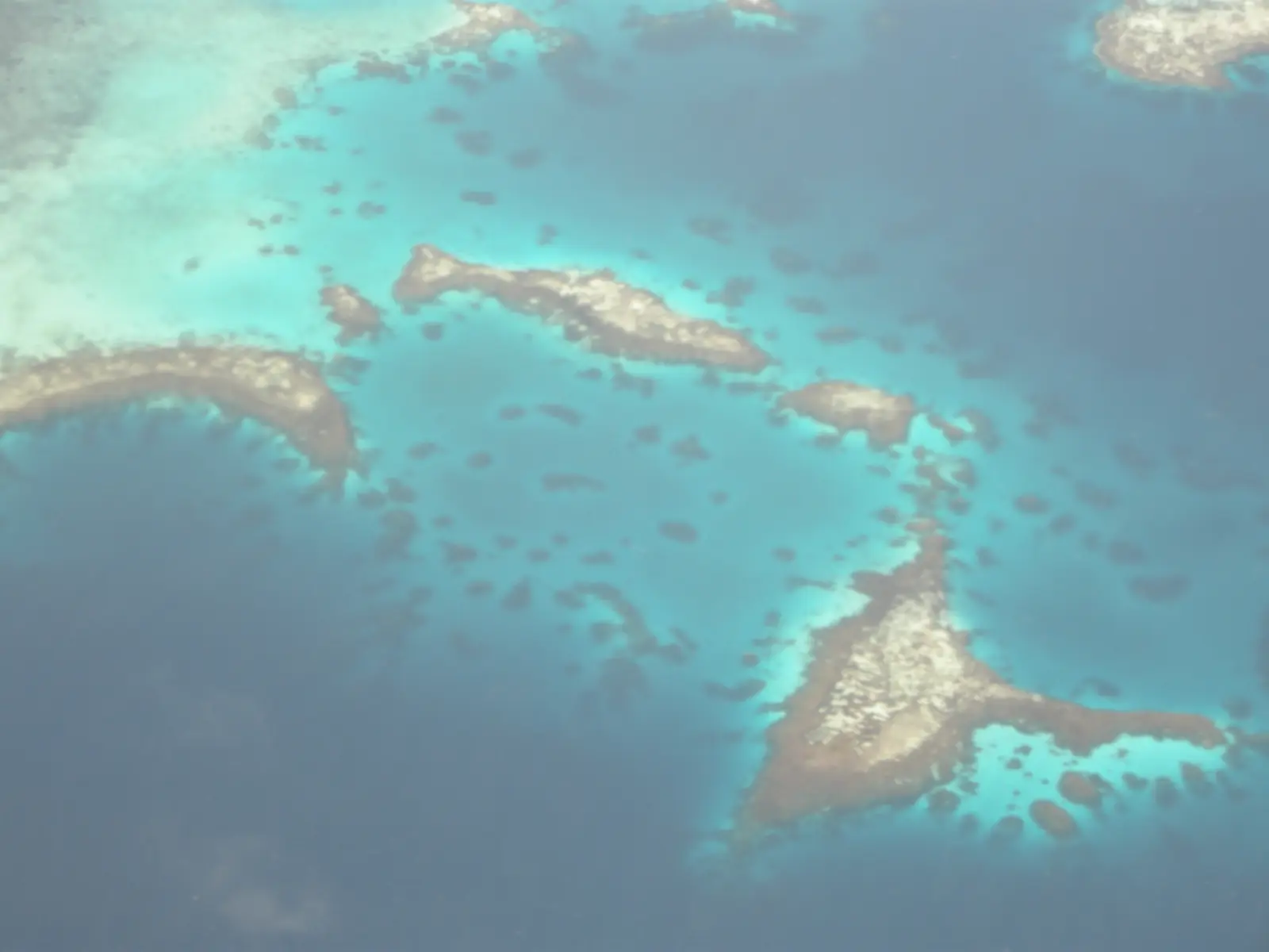 Aerial view of reefs and islets inside Chuuk Lagoon